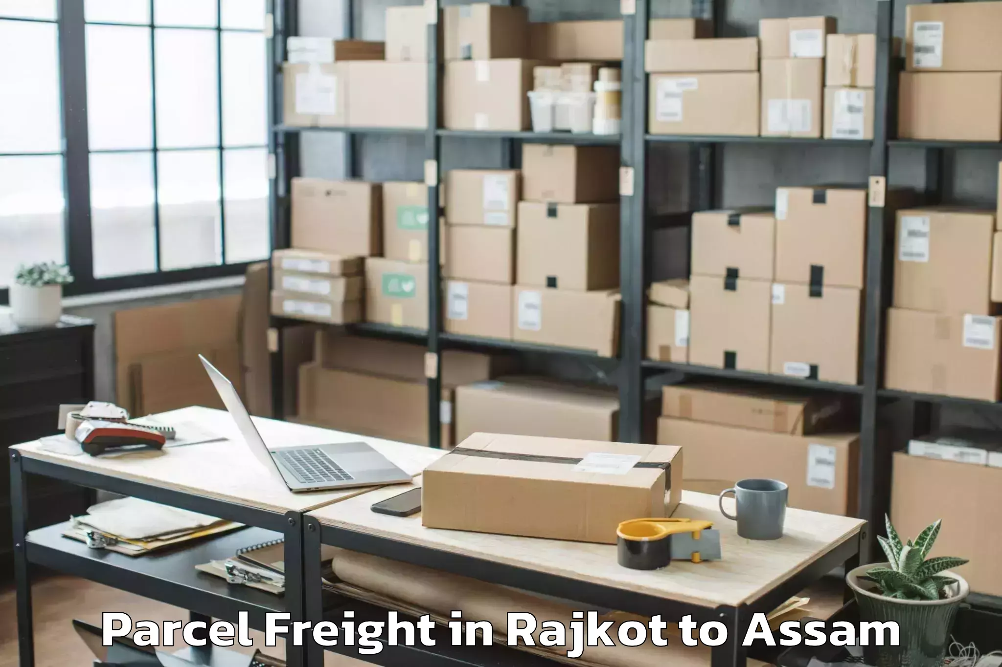 Top Rajkot to Abhilashi University Jorhat Parcel Freight Available